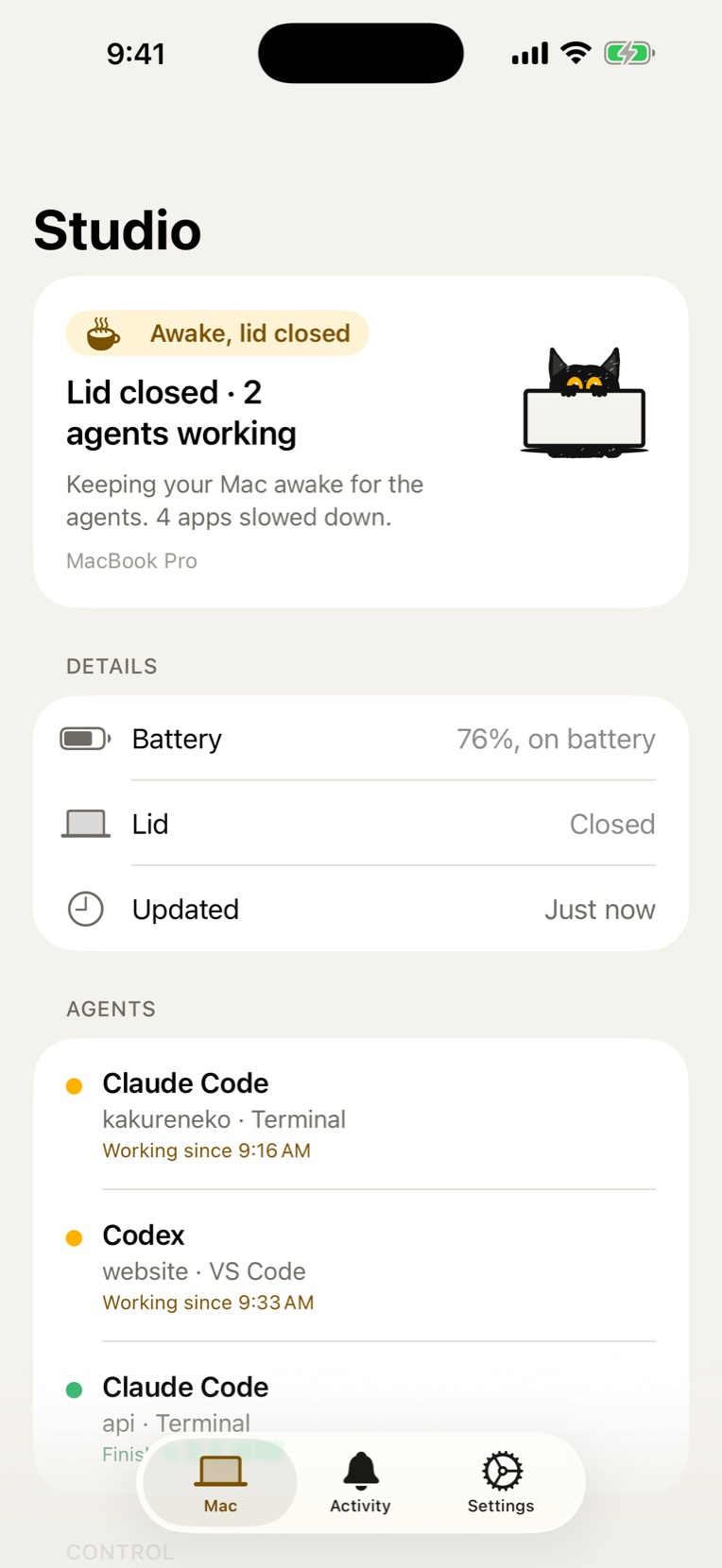 Kakureneko on iPhone: the Mac is awake with the lid closed and two agents are working.